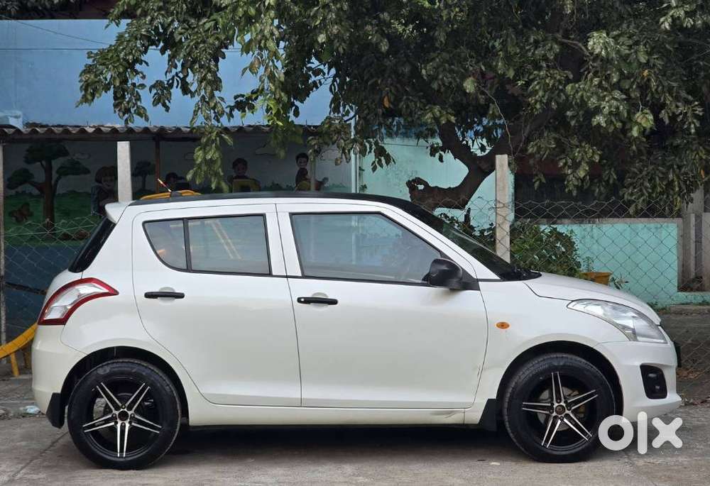 Maruti Suzuki Swift Lxi Optional-o, 2017, Petrol