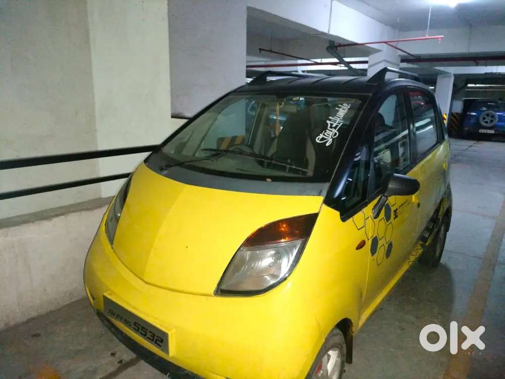 Tata nano wrapped car with alloy wheels and tubeless tyres modified