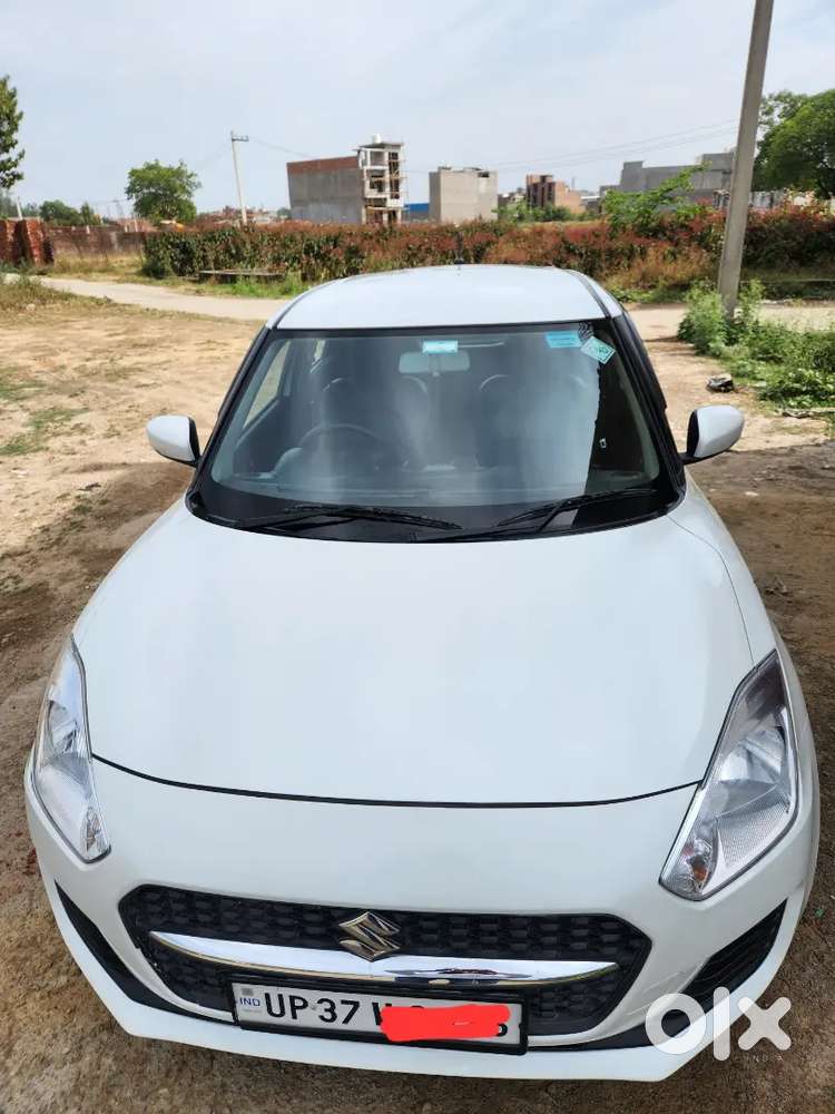 Maruti Suzuki Swift Vxi Green Cng