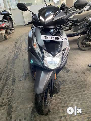 Dio black bike price best sale