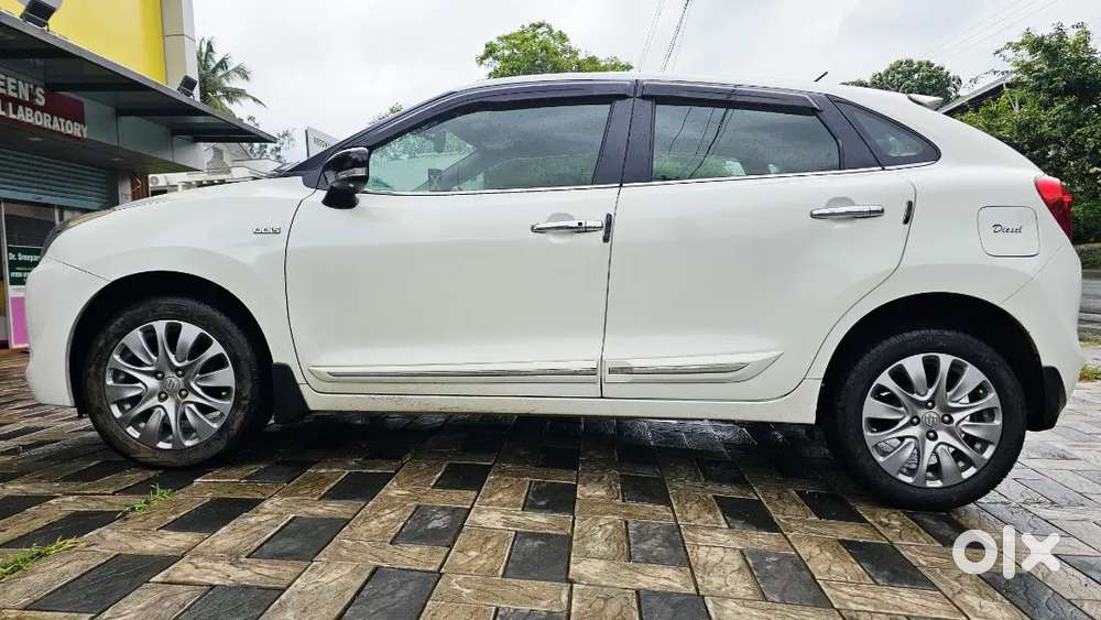 2017 Maruti Suzuki Baleno Alpha Diesel  Pearl White  91,000 Km  Sho