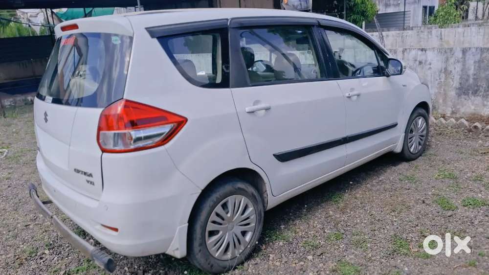 Ertiga White Color Cng Good Condition Tire New