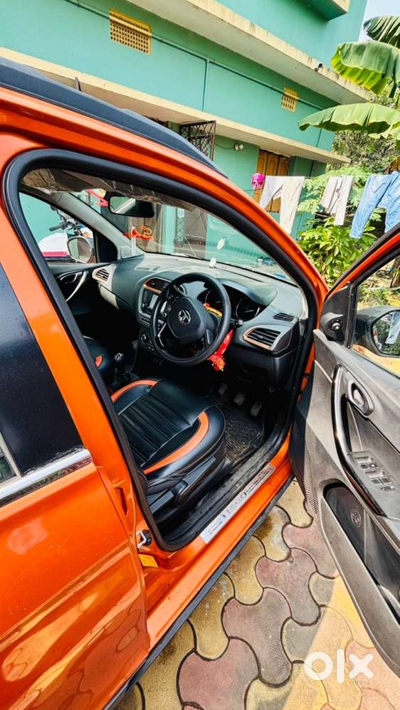Tata Tiago Nrg Manual Petrol &ndash; Orange Colour &ndash; 66,647 Km Driven