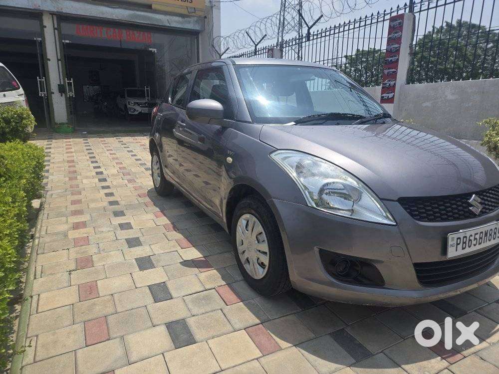 Maruti Suzuki Swift Lxi Optional-o, 2013, Petrol