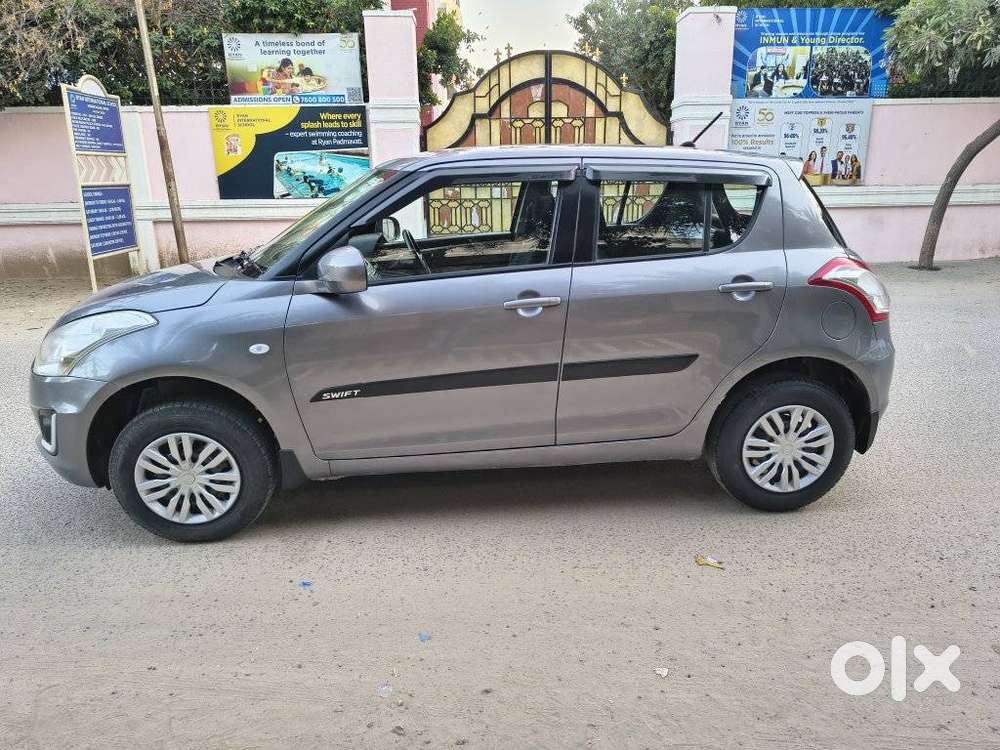 Maruti Suzuki Swift Lxi Optional-o, 2015, Petrol