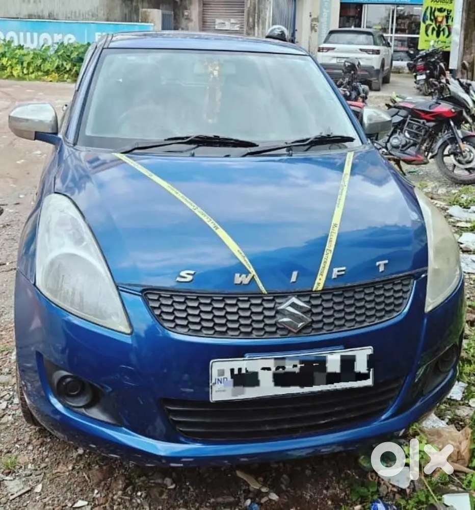 Maruti Suzuki Swift Lxi 2013