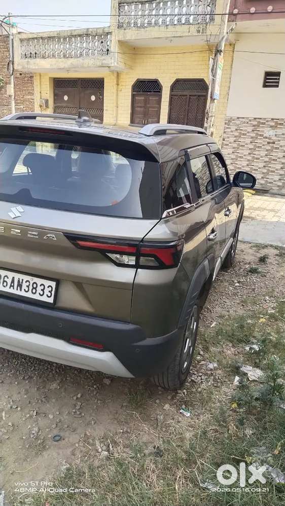 Maruti Suzuki New Brezza 2023. My Car Insurance Feb. 2027.