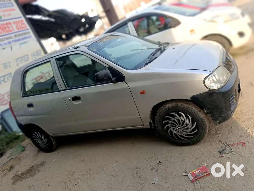Maruti Suzuki Alto Lxi , Company Fitting Centre Lock, Power Steering