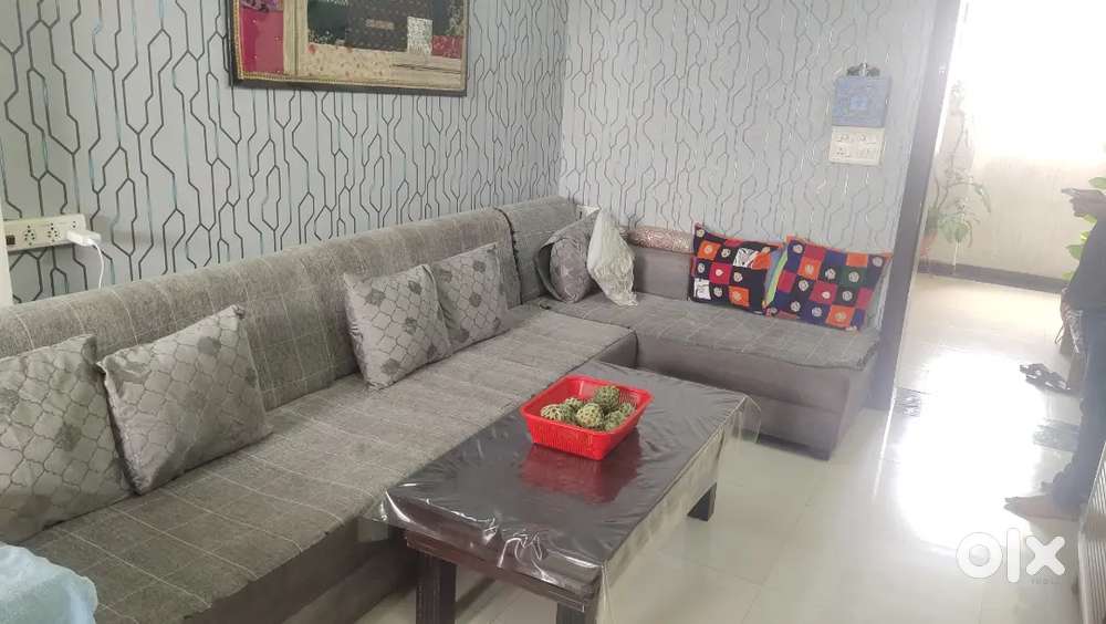 8 seated sofa with sleeping couch, dinning table, and coutions