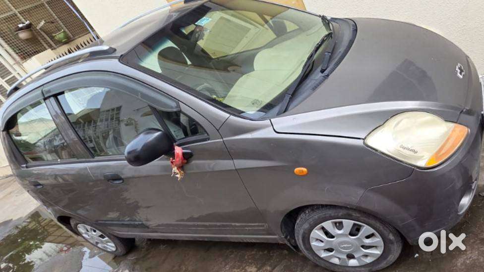 Selling Well Maintained And Less Used Spark Car