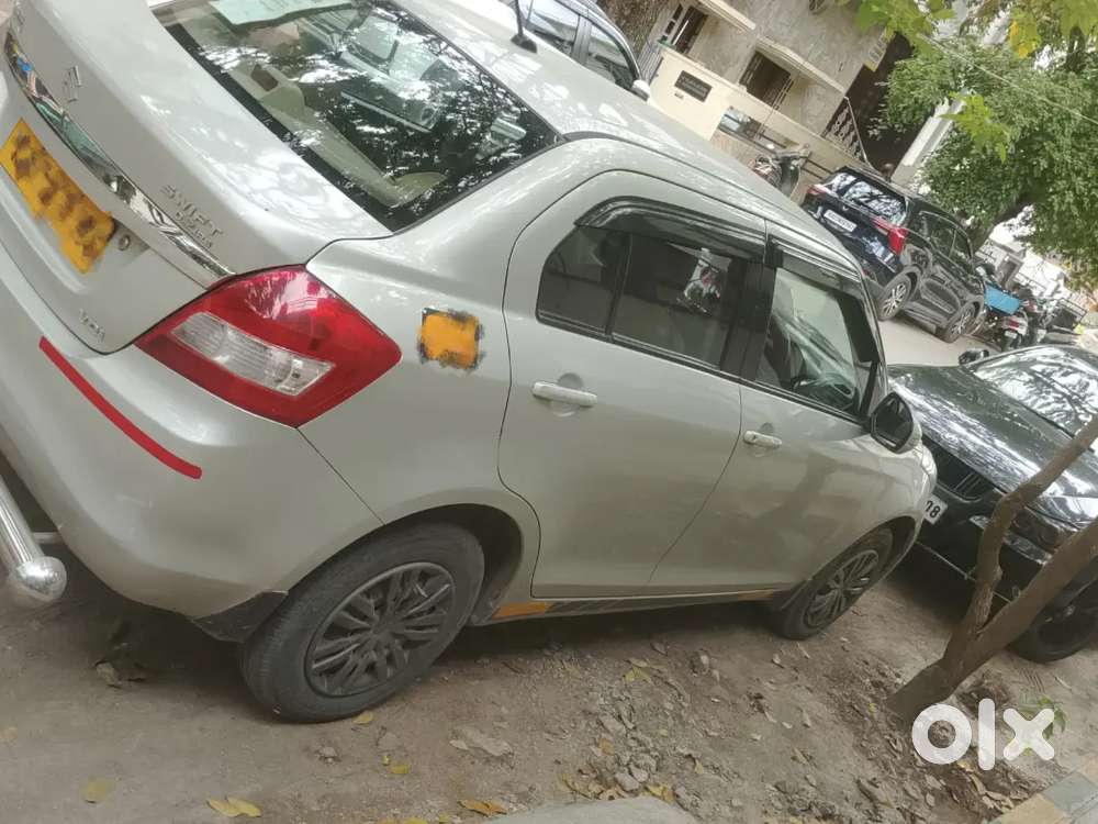 Maruti Suzuki Swift Dzire 2015 Yellow Board