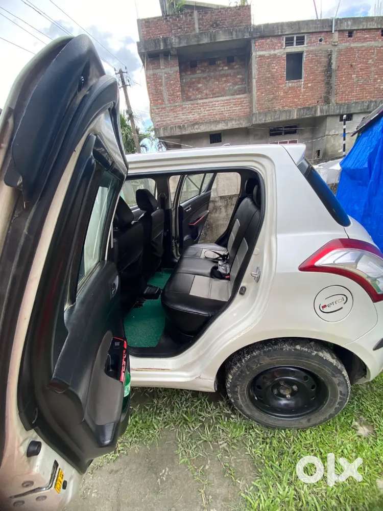 Maruti Suzuki Swift Lxi 2014