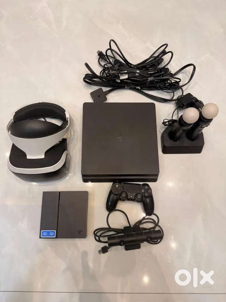 PS4  1TB with VR headset and two motion sticks