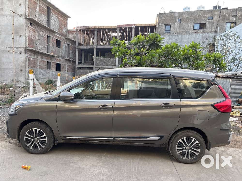 Ertiga Vxi (o) Cng Dec 2024 Brown 12000 Km