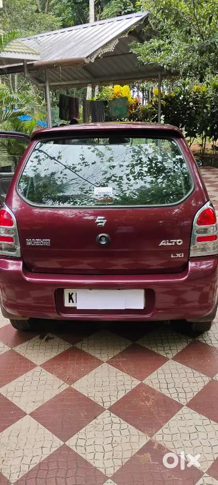 Alto Lxi 2009 Model With 100900 Km And Red Wine Colour.