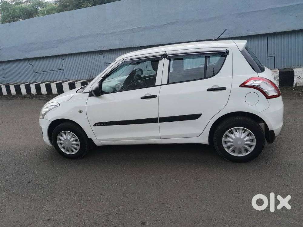 Maruti Suzuki Swift Lxi Optional-o, 2017, Petrol