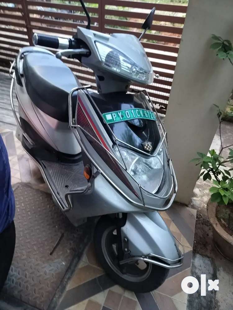 Second hand electric scooter olx sales