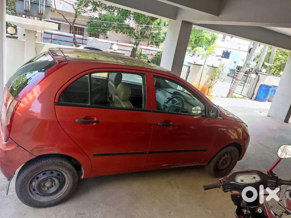 Tata Indica Vista Aura Tdi Ls - Solar Orange Colour