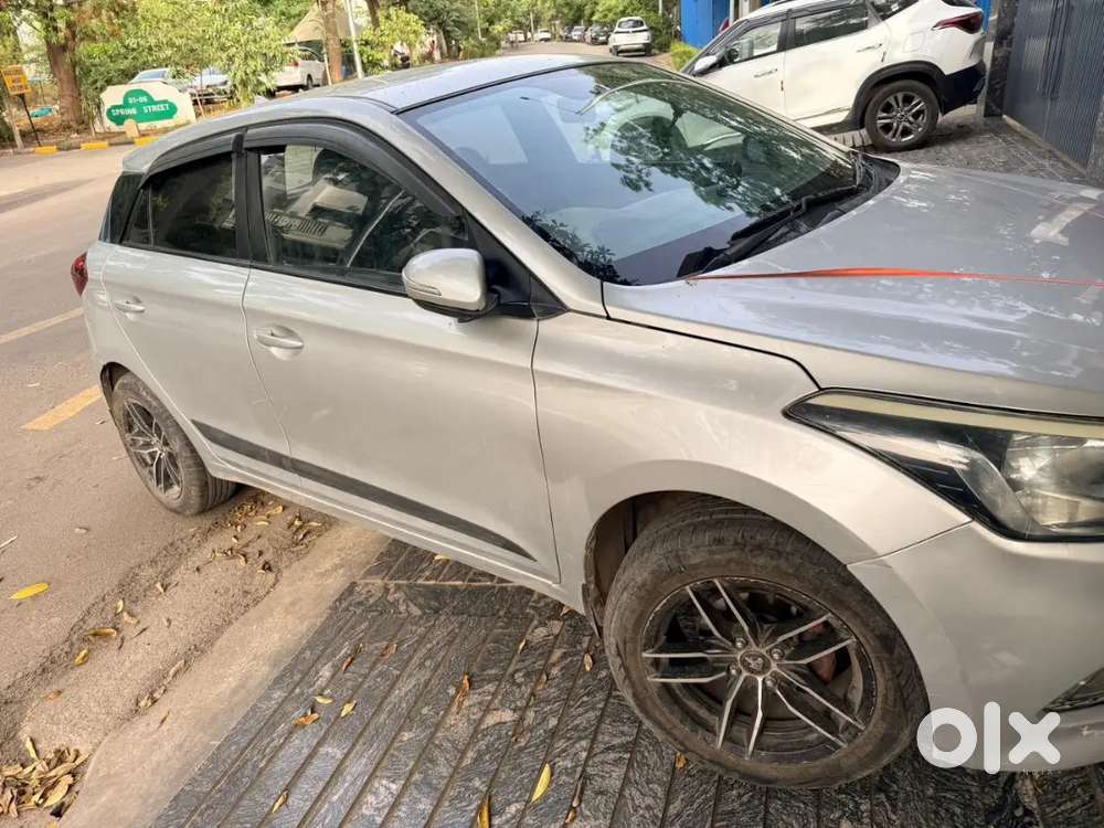 Hyundai I20 Sports Petrol Manual 50000 Km Run Silver Color.