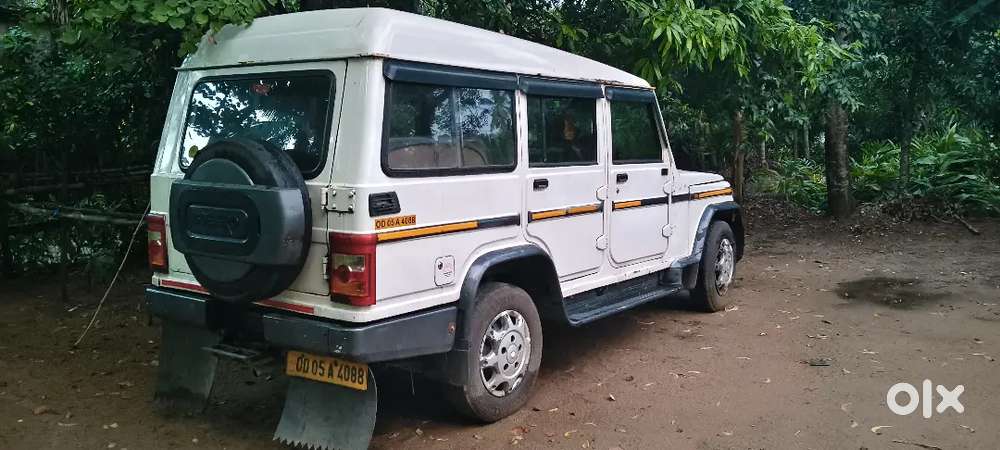 Mahindra Bolero + 2013 car
