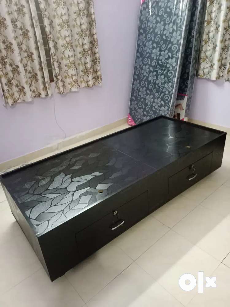 Single bed with box deals storage olx