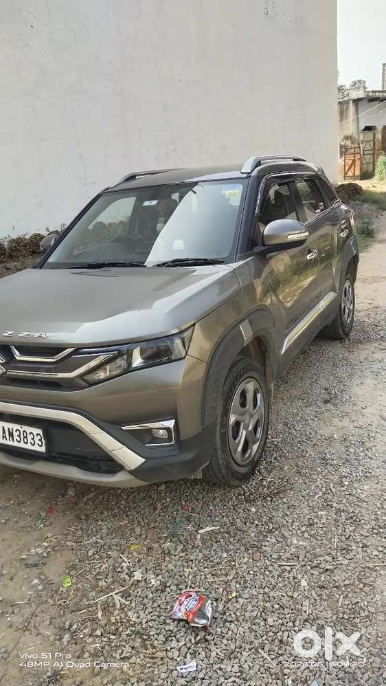 Maruti Suzuki New Brezza 2023. My Car Insurance Feb. 2027.