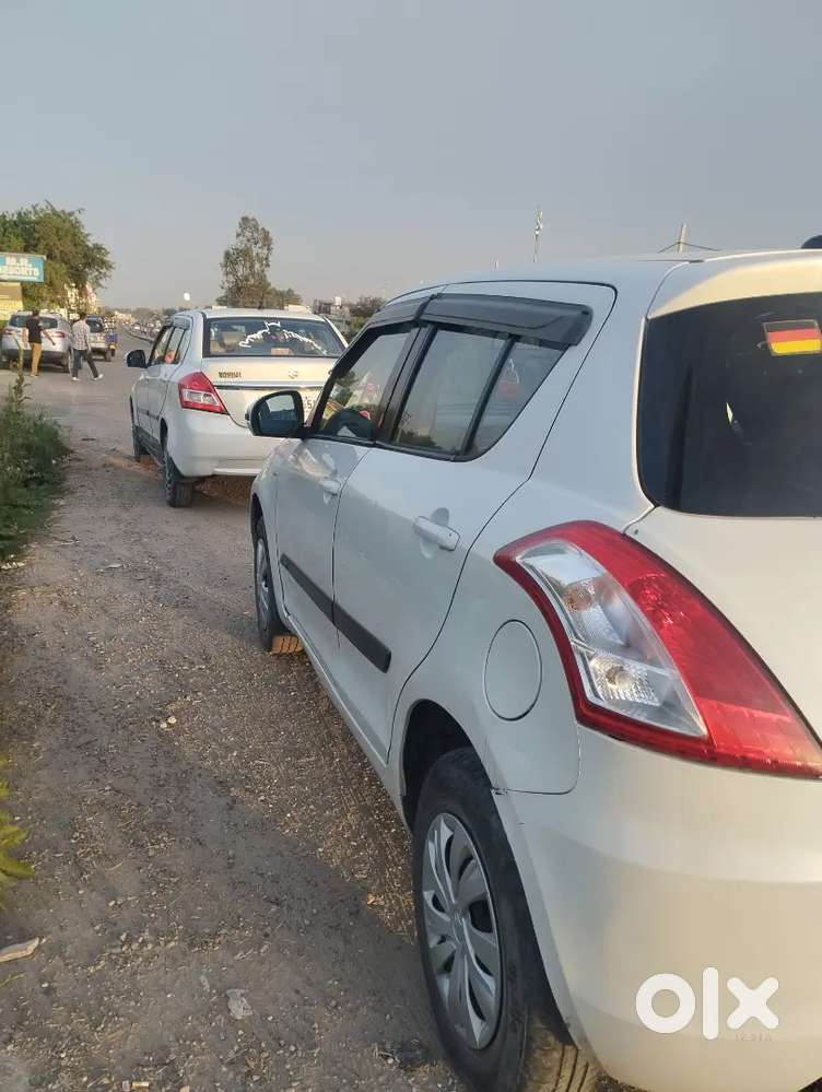 Maruti Suzuki Swift Lxi 2016