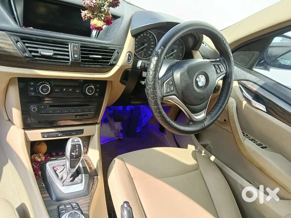 Bmw X1 2015  Rs.12,50,000/-  Registration Brown Colour 2nd Owner
