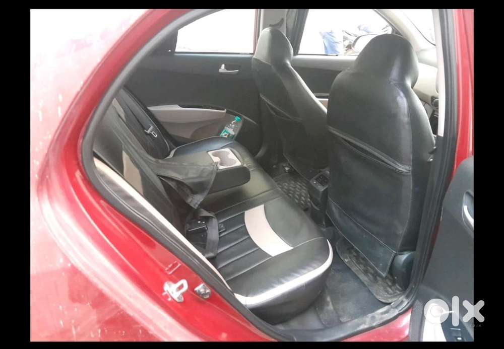 Red Colour Hyundai Xcent 2015 Petrol In Very Good Condition