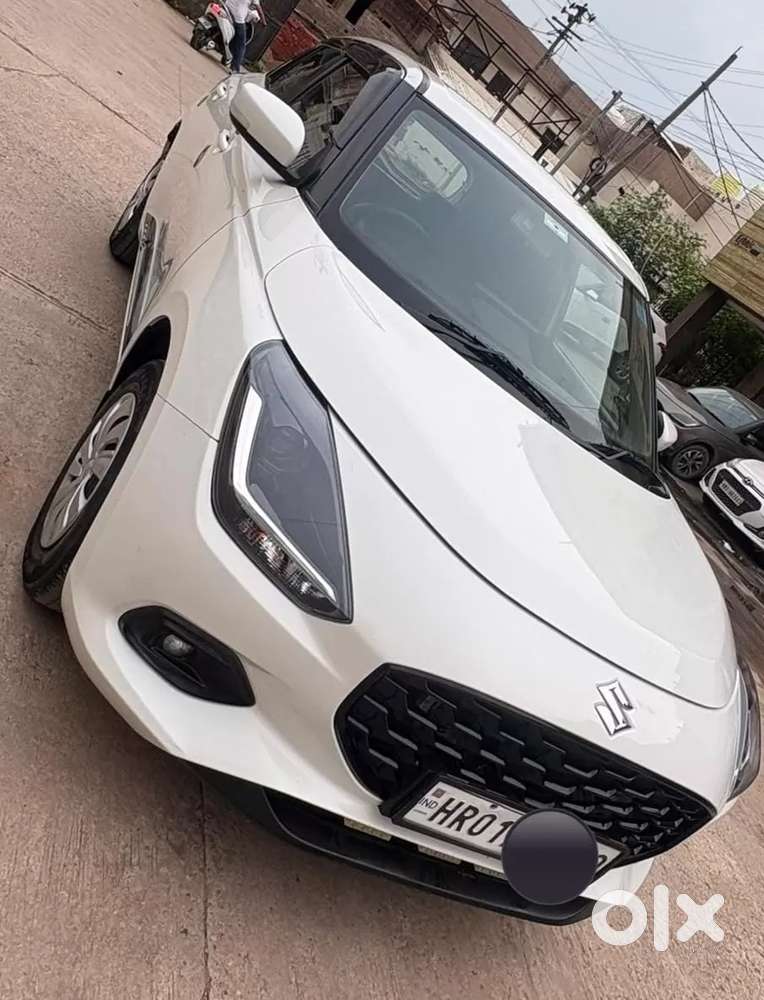 Maruti Suzuki Swift 1.2 Vxi (o), 2024, Petrol