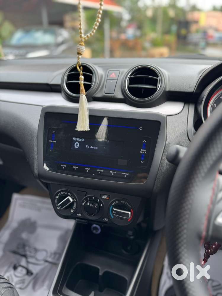 Swift 1.2 Vxi 2021 Km Driven