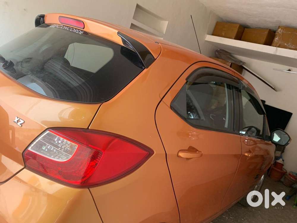 Gold Orange Tiago 1.2 L Petrol Maintained