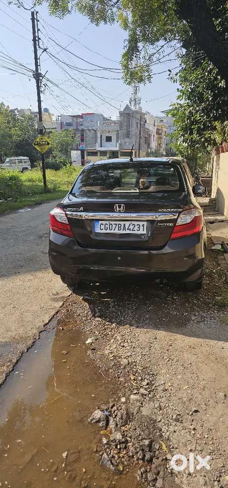 Honda Amaze In Golden Brown Colour In Well Condition
