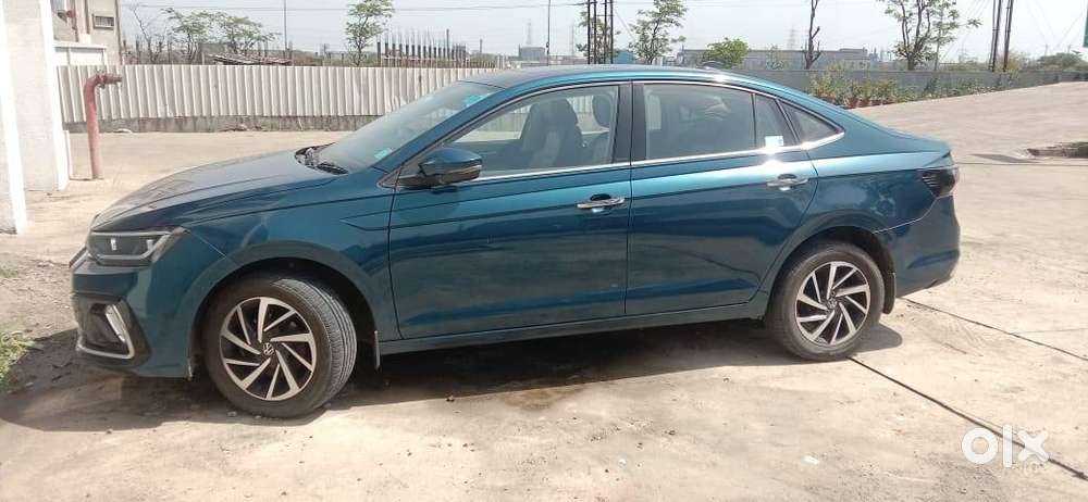 Virtus Petrol Auto 2023 Lava Blue Showroom Condition