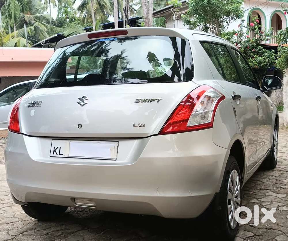 Low Km Driven Single Owner Swift Lxi Full Correct Service