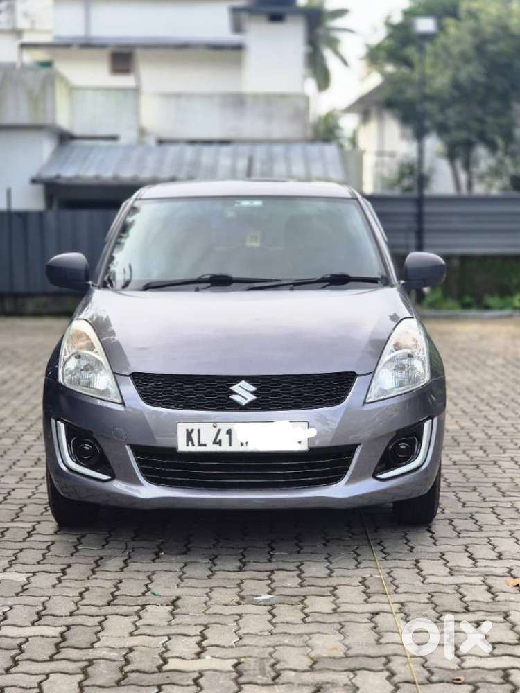 Maruti Suzuki Swift Lxi Optional-o, 2015, Petrol