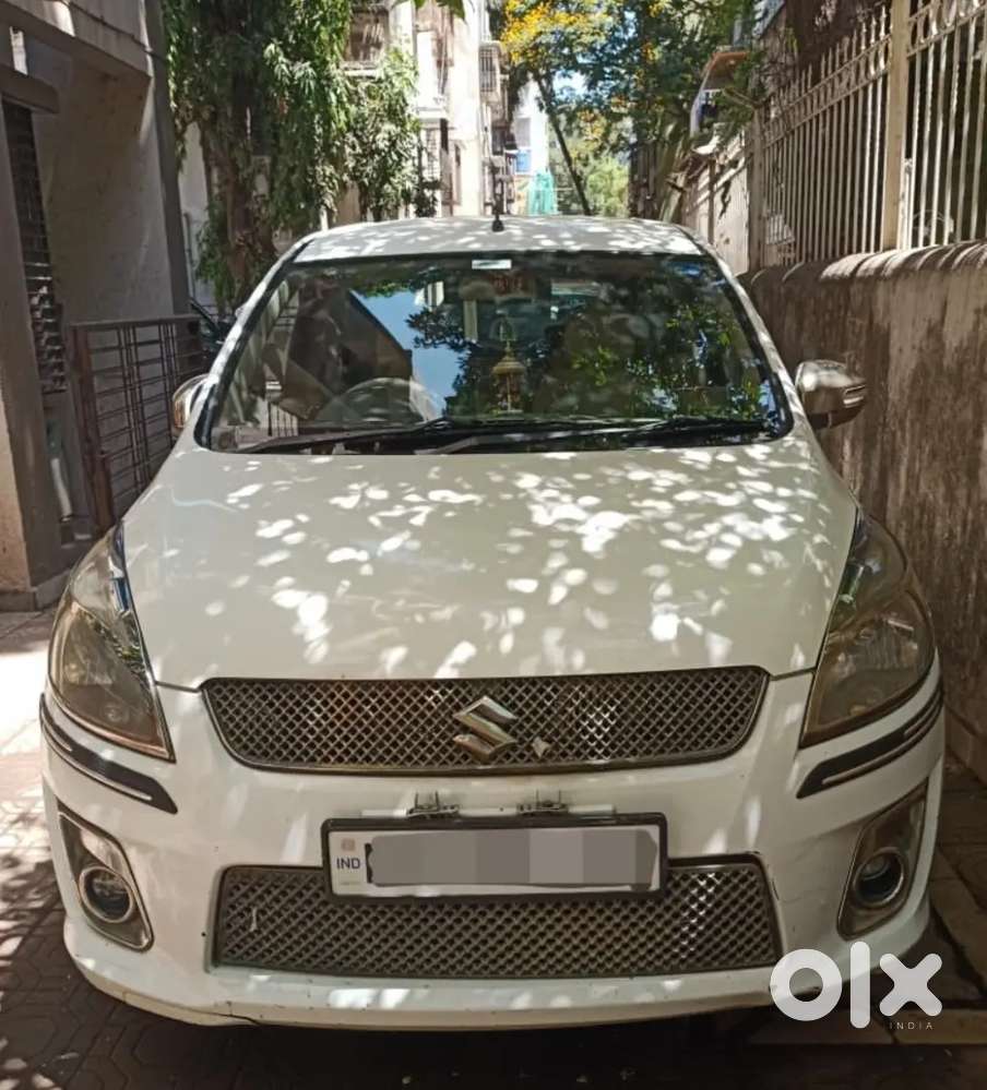 1owner Ertiga Vxi White Color