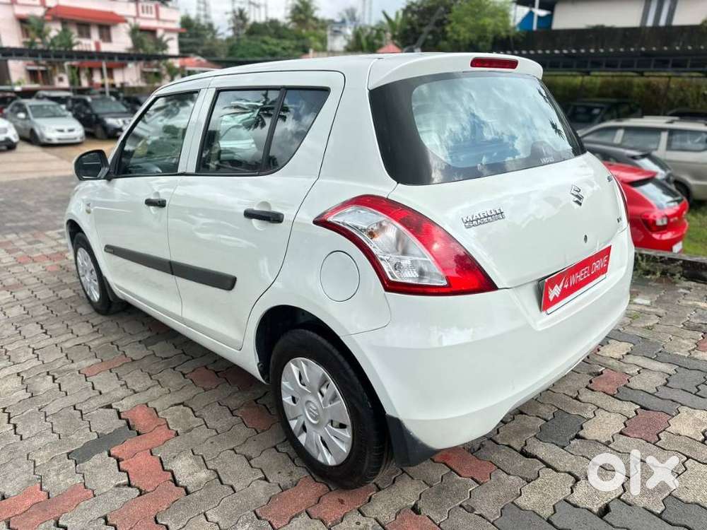 Maruti Suzuki Swift Lxi Optional-o, 2013