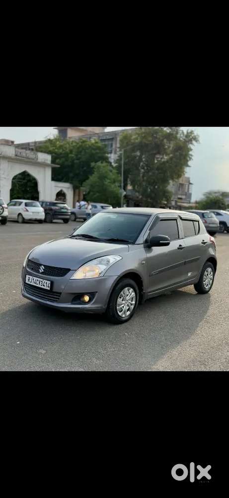 Maruti Suzuki Swift Lxi 2014
