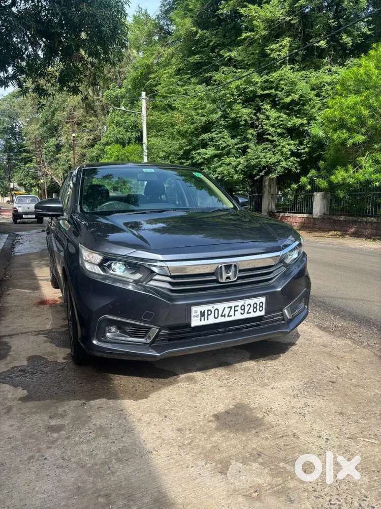 Grey Colour Honda Amaze Good Maintain New Condition