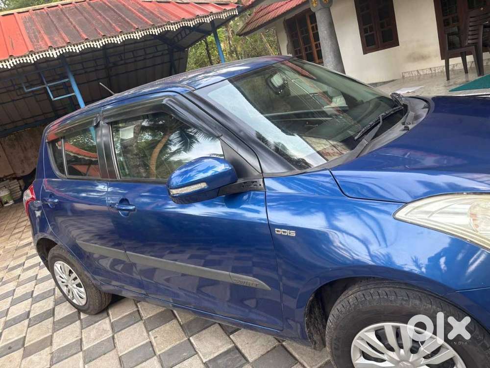 Well-maintained Maruti Swift 2012 (blue)  2l Km  Pristine Condition