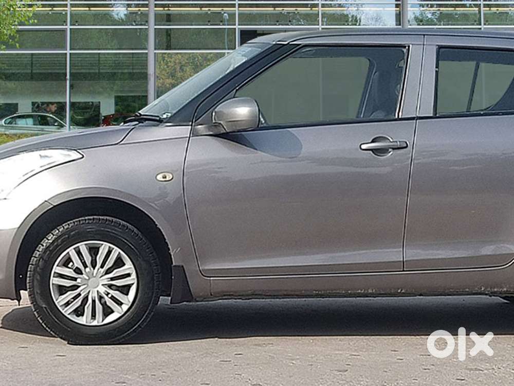 Maruti Suzuki Swift Lxi Optional-o, 2016, Petrol
