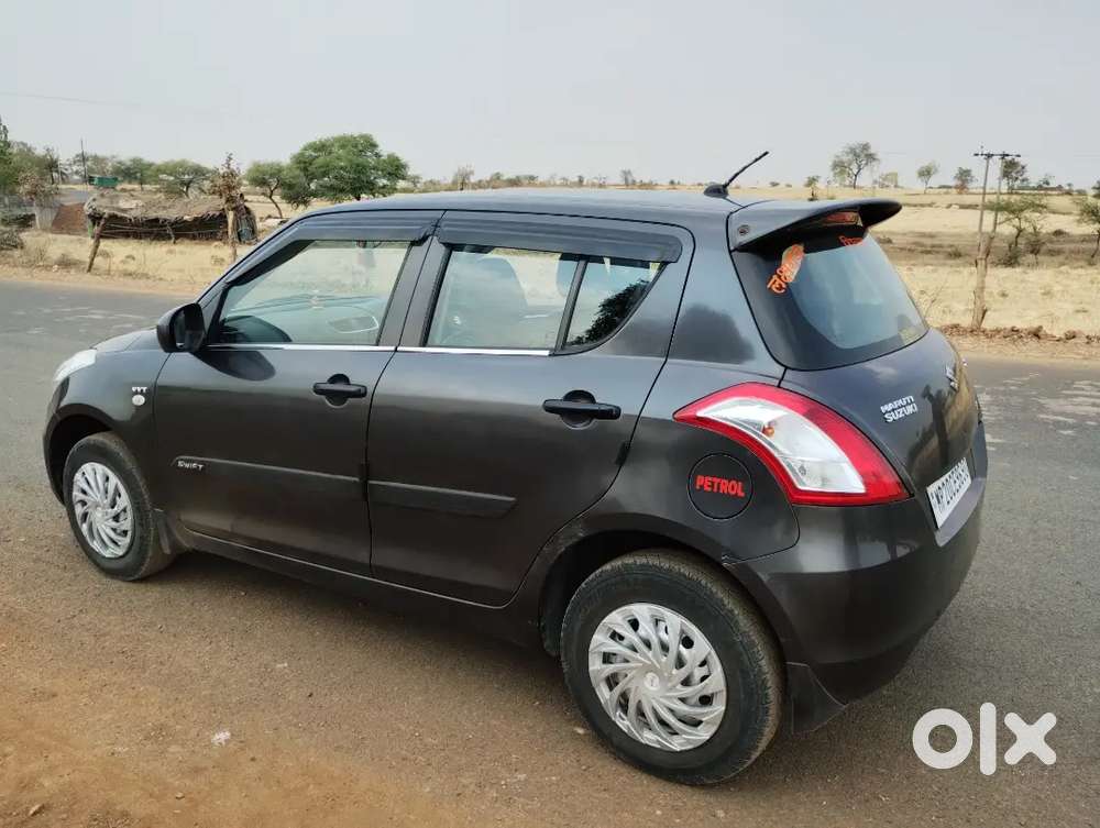 Maruti Suzuki Swift Petrol 2015 Variant Lxi Option