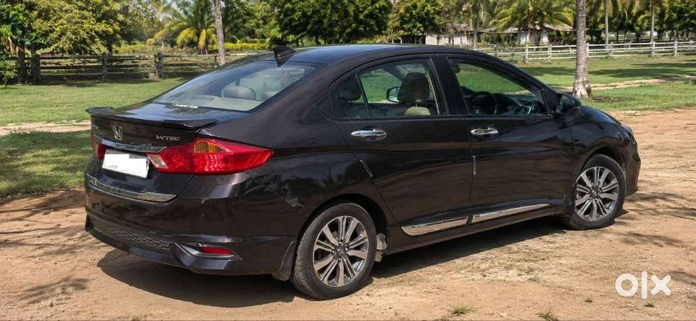 Honda New City V (petrol + Cng) Golden Brown