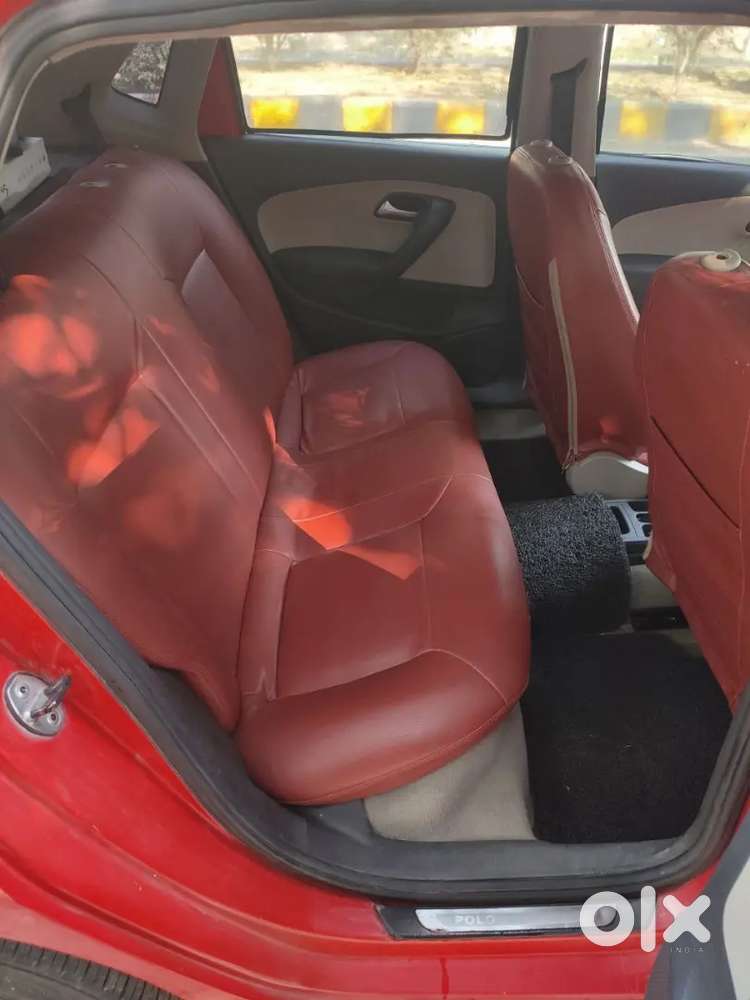 It's A Red Colour Polo With 17 Inchi Alloys