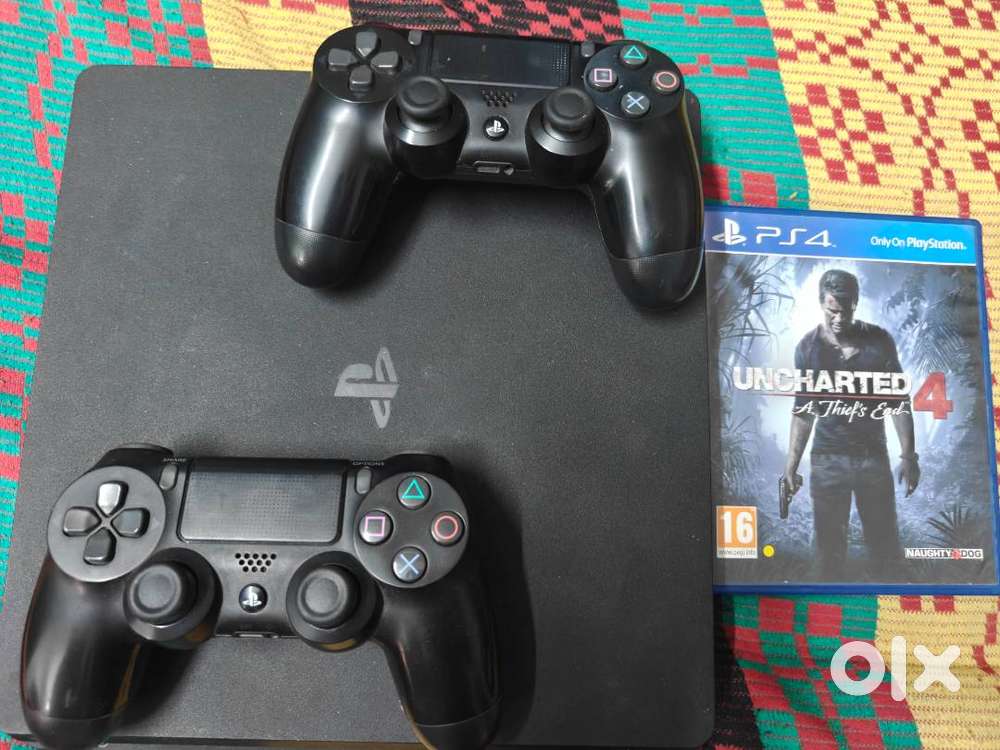 PS4 Slim 1TB with 2 Original Sony DualShock 4 Controllers