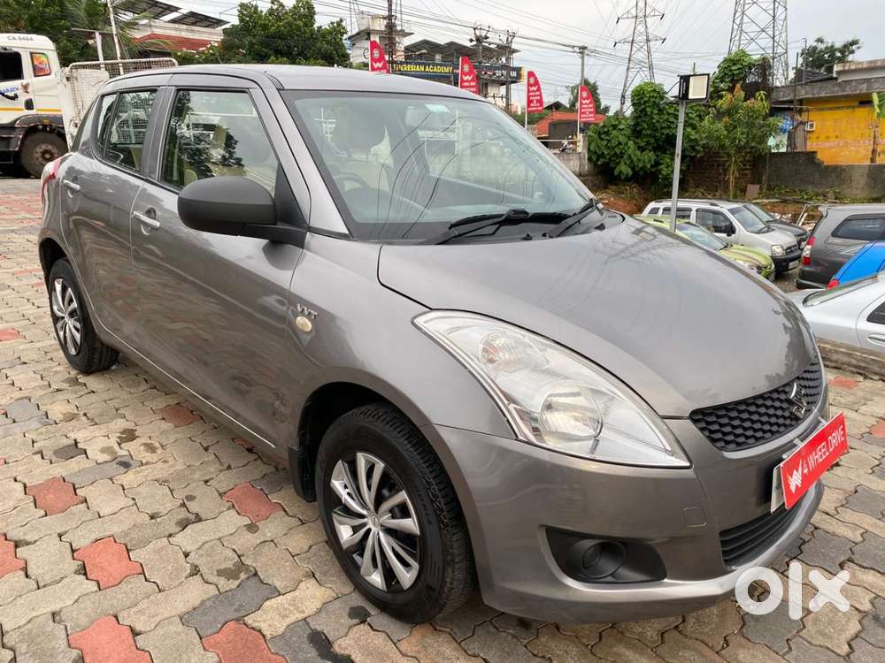 Maruti Suzuki Swift Lxi Optional-o, 2014, Petrol