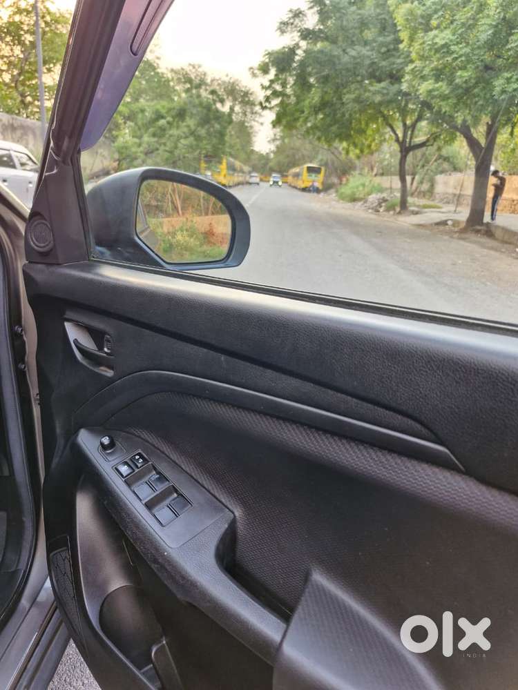 Maruti Suzuki Brezza 1.5 Lxi Smart Hybrid, 2024, Petrol