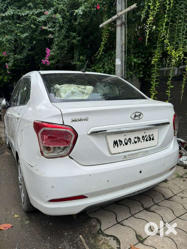 Xcent Car Less Driven White Colour New Tyre New  Battery
