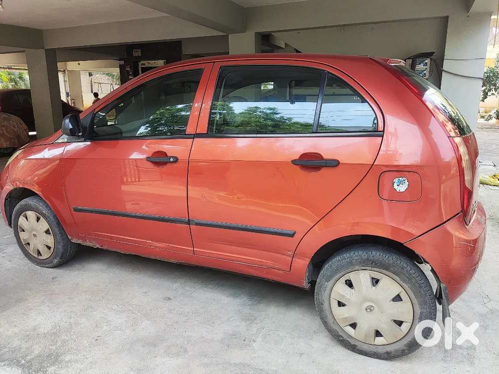 Tata Indica Vista Aura Tdi Ls - Solar Orange Colour